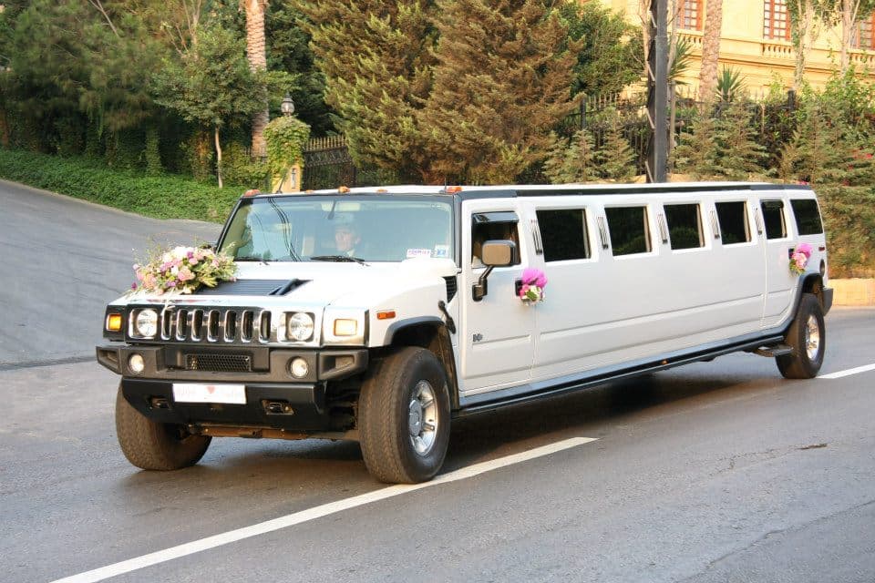 White stretch hummer limousine cruising in Beirut, Lebanon